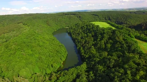 Aerial over small pond Stock Footage 64321106