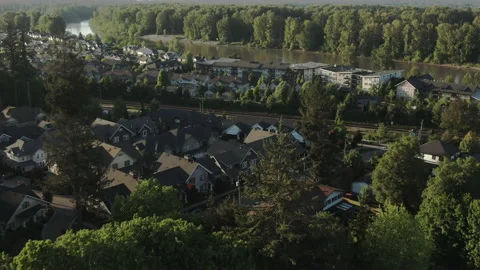 Aerial over smalltown by a river Video stock 154658484