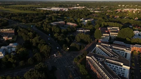 Aerial Over Town Road Intersection w Buildings In Golden Hour Light 스톡 동영상 343157473