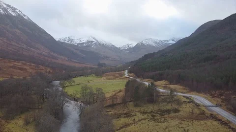 Aerial over valley and mountains in Scotland Stock Footage 122215822