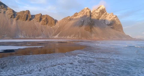 Aerial Over Waves ands Beach at Vestrahorn Mountains and Coastline Stock Footage 88281934