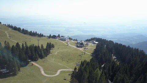 Aerial of overhead cable car moving over the beautiful landscapes Video stock 85966899