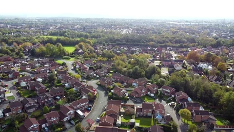 Aerial Overhead Drone Shot over Town in UK, Houses and Trees (4K) Stock Footage