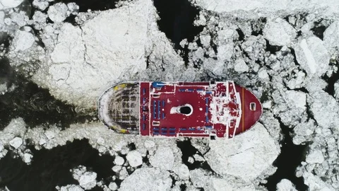 Aerial: Overhead of Ferry Breaking Ice Stock Footage 88975226