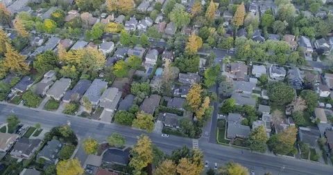Aerial: overhead of Menlo Park in Silicon Valley at sunset Stock Footage