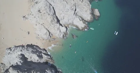 Aerial overhead shot progressing over the coastline of Cabo San Lucas Stock-Footage 74720599