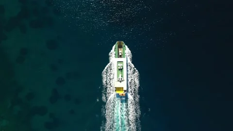 Aerial Overhead shot on ship in middle of the sea. Vessel, Shipping container. Stock Footage 224401211