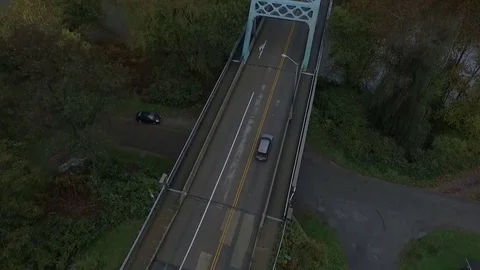 Aerial Overhead Small Bridge River with Traffic Stock Footage 82733389