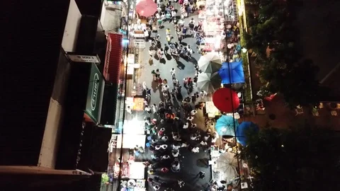 Aerial Overhead View of a  Crowded Walking Night Market in Chiang Mai, Thailand Stock-Footage 123737626