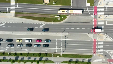 Aerial overhead view of multilane road intersection with vehicles Stock Footage 311830035