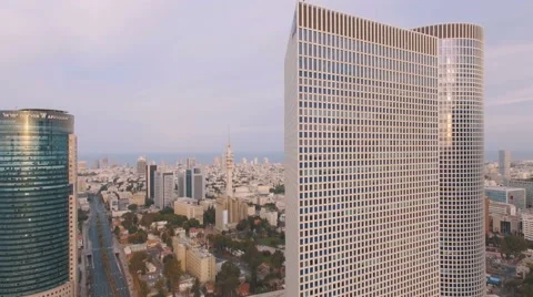 Aerial overhead view Tel Aviv city skyscrapers Azrieli, Electra at sunset / sunr Vidéo 69028463