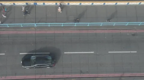 Aerial overhead view of traffic on Tower Bridge, London Stock Footage