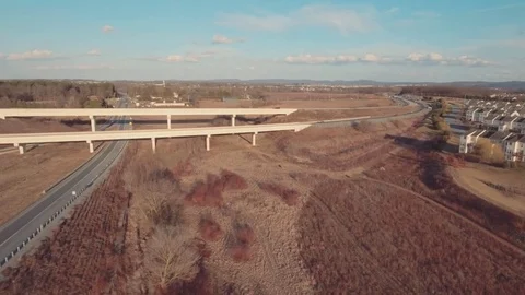 Aerial overpass by highway exit Stock Footage 72968094