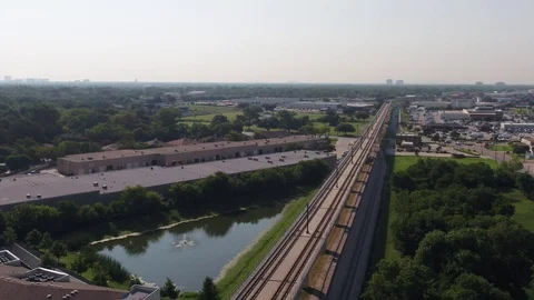 Aerial Overview of DART Train and Track Leading into Dallas Stock Footage 81969964