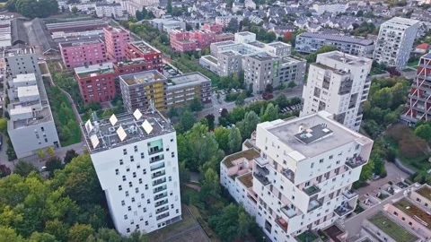 Aerial overview of modern, angular architecture in the La Courrouze urban Stock Footage 323373139