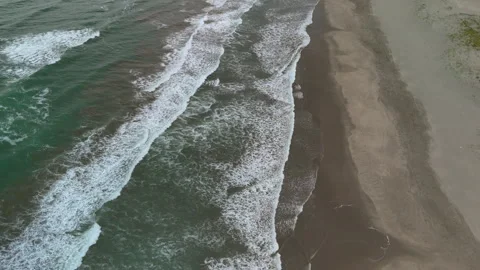 AERIAL Pacific Ocean waves hitting a sandy shore in Japan Stock Footage 287006923