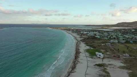 Aerial Pallax Over Beach During Sunset Stock Footage