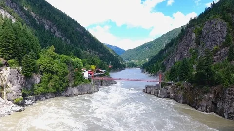 Aerial pan across river by Hells Gate British Columbia Vídeo Stock 90680473