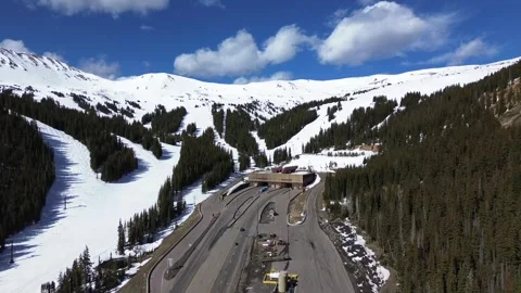 Aerial Pan Back of Eisenhower-Johnson Tunnel East Entrance in Colorado Stock Footage 310069824