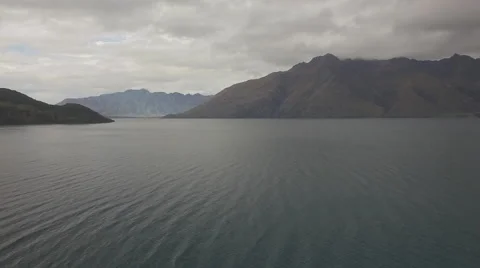 Aerial Pan of Cloudy Lake Stock Footage 64137109