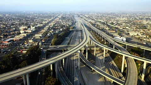 Aerial Pan Down-Bustling Multi-Layered Bridges With Town Behind in Los Angeles, Stock Footage 107183863