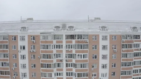 Aerial pan down shot of windows of modern panel houses. Residential complex Stock Footage 122692768