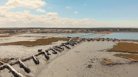 Aerial pan down view of the Carrasqueira harbour in Comporta, Portugal. Stock Footage 90761399