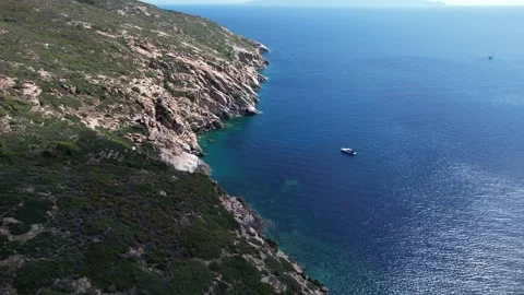 Aerial pan drone view Capel Rosso Lighthouse sea path Giglio Island Italy Stock-Footage 244945432