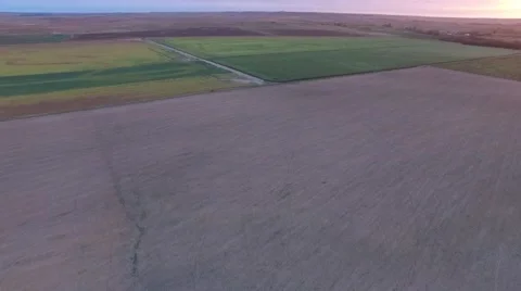 Aerial Pan of Fields at Sunset Stock Footage 64978032
