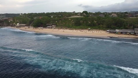 Aerial pan left toward viewpoint at Balangan Beach, Bali Stock Footage 329004074