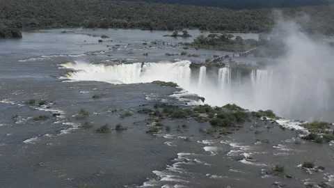Aerial pan left view over the Iguazu Falls, waterfalls, devil's throat, foz do Stock Footage 305488729