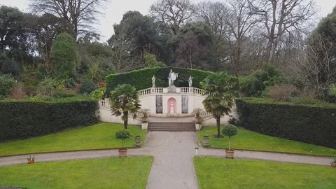 Aerial pan of monuments in park and ending revealing forest Stock Footage 122215913