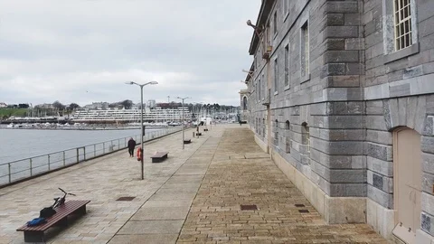 Aerial pan next to harbour in UK Stock Footage 122215865