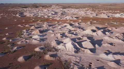 Aerial pan of opal mine mullock heaps at coober pedy Stock Footage 163948153