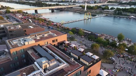 Aerial Pan over Copa Beach and New Danube During Partial Solar Eclipse in Vienna Stock Footage 342990847
