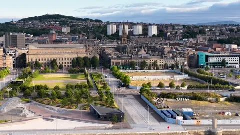 Aerial Pan Over Dundee Riverfront and Historic Cityscape Stock Footage 320394414