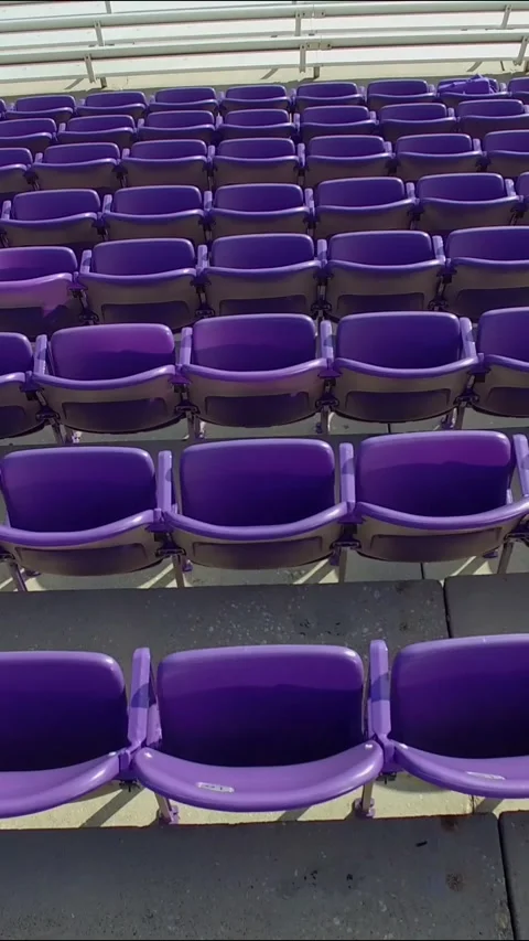 Aerial Pan Over Empty Stadium Seats and Bleachers Video stock 337665409