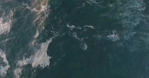 Aerial Pan Over the Ocean and Lighthouse Stock Footage