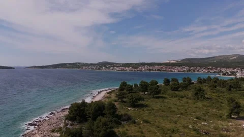 Aerial pan reverse fly of Adriatic coastline with rocky beach Rogoznica Croatia 스톡 동영상 337183292