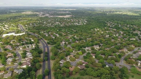Aerial Pan from Right to Left of Generic Suburban Neighborhood Stock Footage 106672193