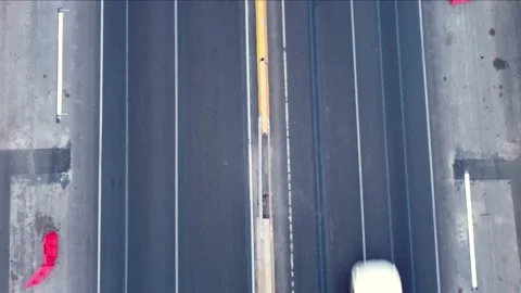 Aerial pan up shot of a highway on a cloudy day Stock Footage 158774658