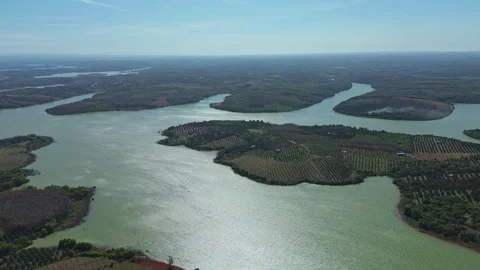 Aerial pan shot of Patchwork Farmland Thac Mo Reservoir in Southern Vietnam Stockbeeldmateriaal 330466094