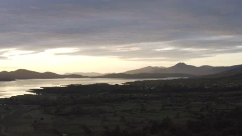 Aerial paning dron shot over sunset in lake Plastira, Greece. 動画素材 147385443