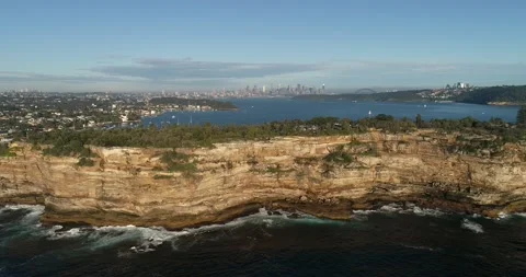 Aerial panning along cliffs of Sydney Eastern suburbs on Pacific coast in 4k. Stock Footage 134920545