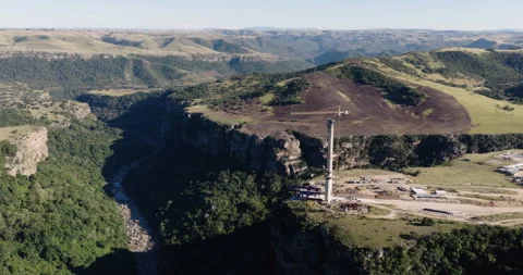 Aerial panning close-up construction of Msikaba Bridge in the Eastern Cape, SA Stock Footage 340132563