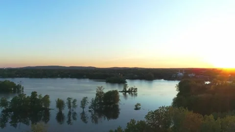 Aerial panning down over the river in Laval during a beautiful sunset Stock-Footage 273124828
