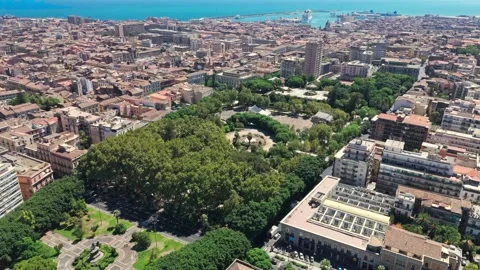 Aerial panning drone view of villa Bellini Public park garden in Catania Stock Footage 346875139
