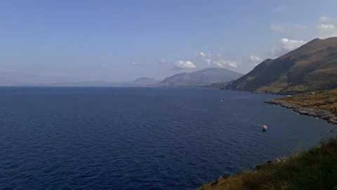 Aerial panning of riserva dello zingaro in sicily Stock Footage 278953892