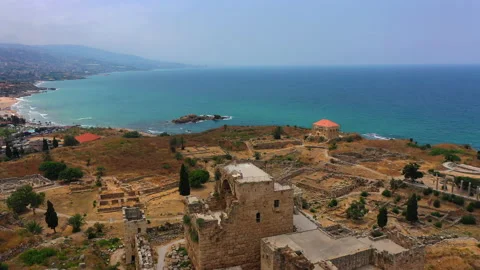Aerial Panning Tourists Exploring Structure In City During Sea - Byblos, Lebanon Stock Footage 166255242