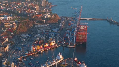 Aerial Panning View of Container Ship Unloading at Valparaiso Port, Chile Stock Footage 333857802